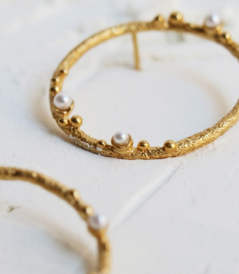 Pendientes circulares dorados GUSPIRA