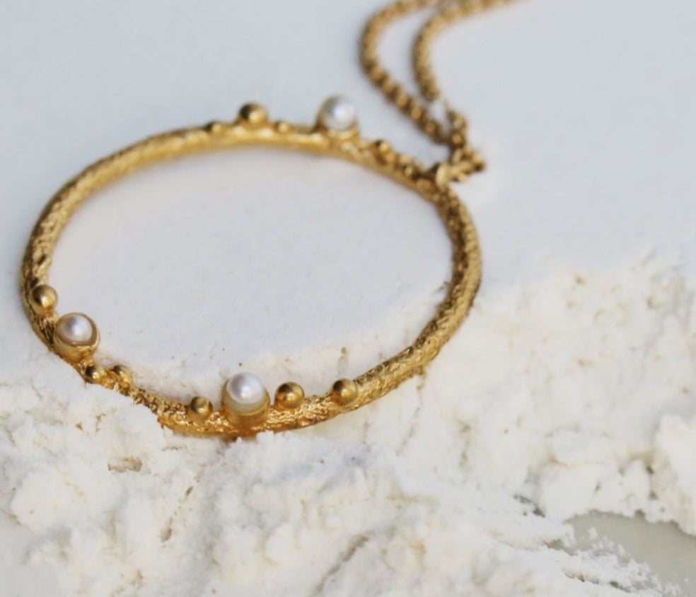 Collar circular dorado GUSPIRA
